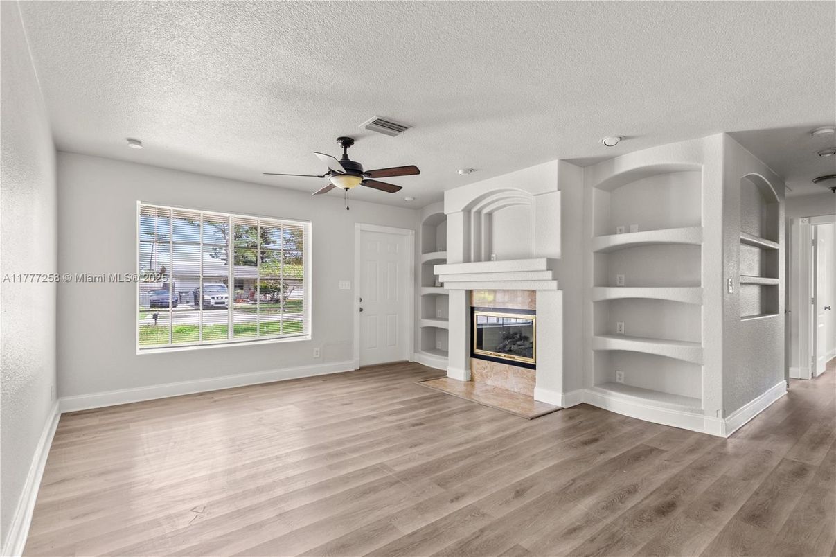 Empty room, Fireplace, Interior, Recessed Lighting, Wood Texture Flooring