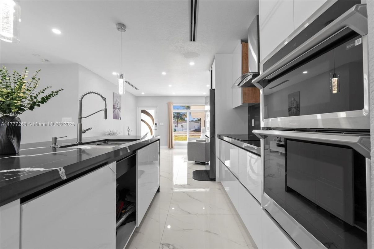 Interior, Kitchen, Marble, Pendant Lights, Recessed Lighting, Stainless Steel Appliances