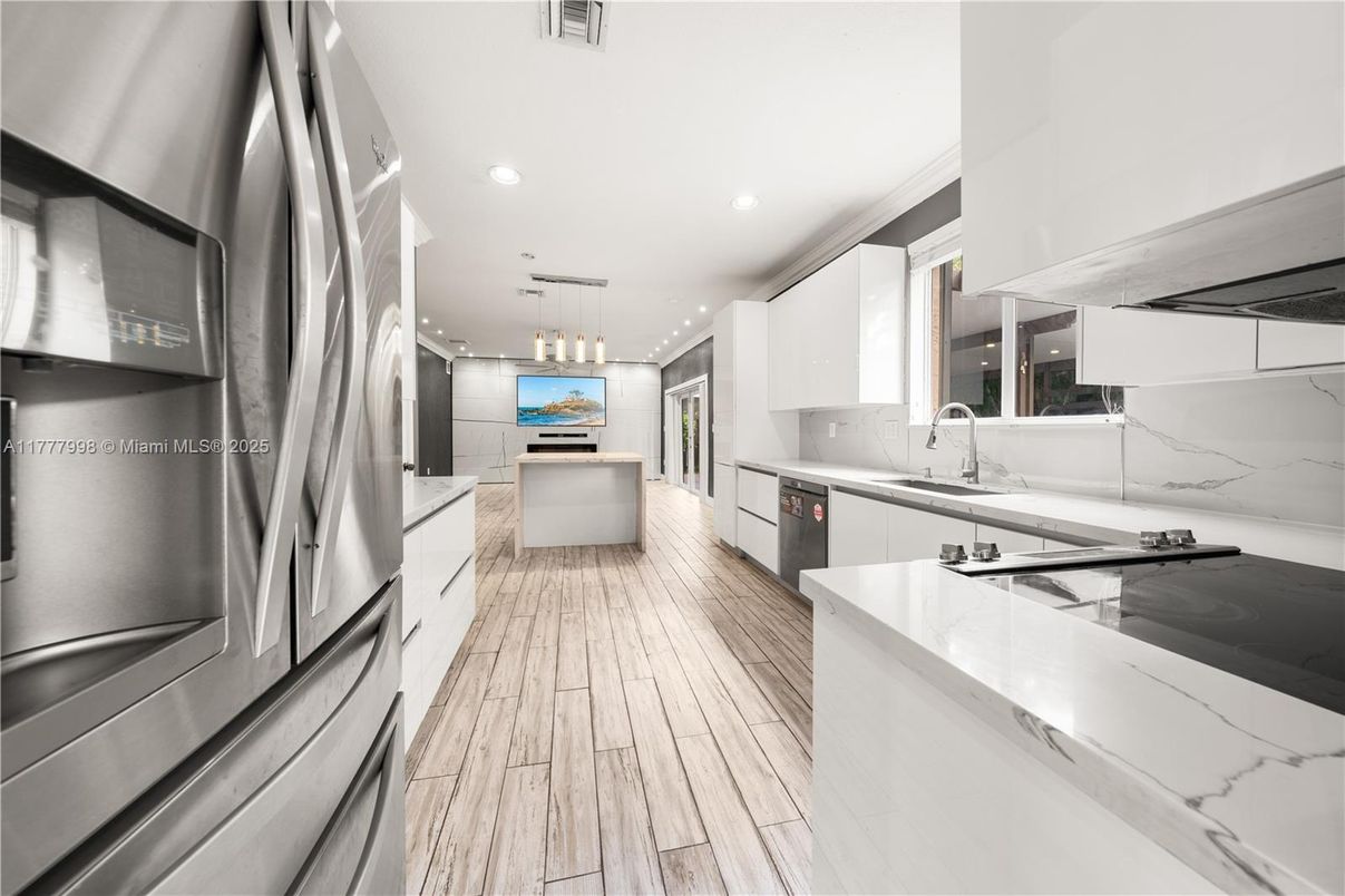 Interior, Kitchen, Pendant Lights, Recessed Lighting, Stainless Steel Appliances, Wood Texture Flooring