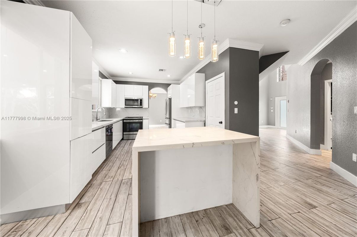 Interior, Kitchen, Pendant Lights, Recessed Lighting, Stainless Steel Appliances, Wood Texture Flooring