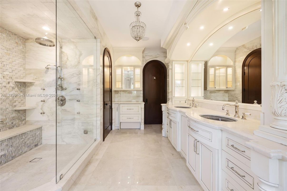 Bathroom, Dual Sink Vanities, Glass Shower, Interior, Marble Walls, Recessed Lighting
