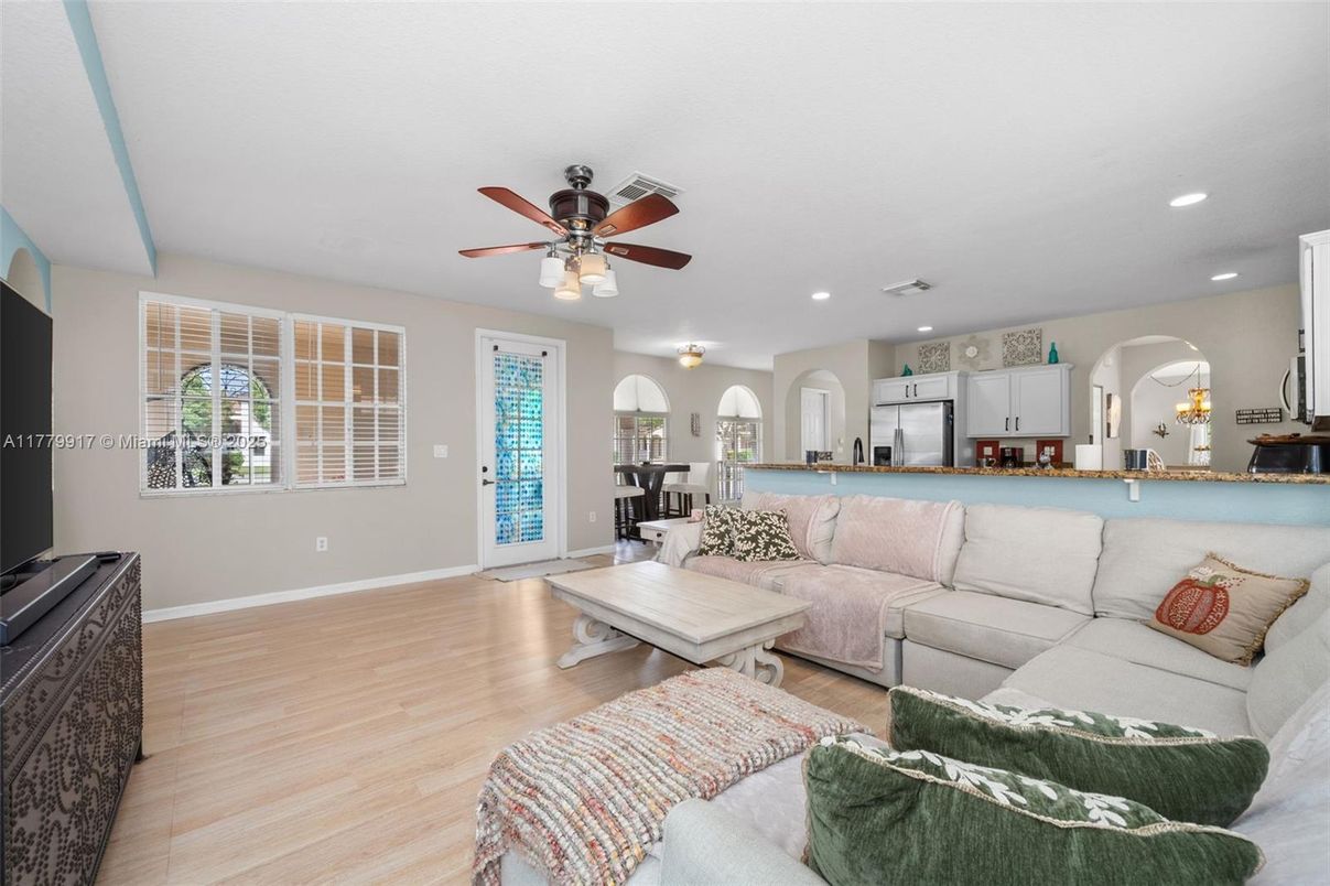 Dining room, Interior, Kitchen, Living room, Recessed Lighting, Stainless Steel Appliances, Wood Texture Flooring