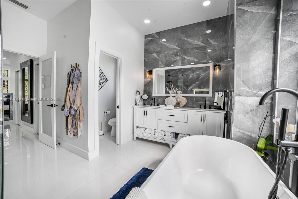 Bathroom, Dual Sink Vanities, Free Standing Baths, Interior, Marble Walls, Recessed Lighting