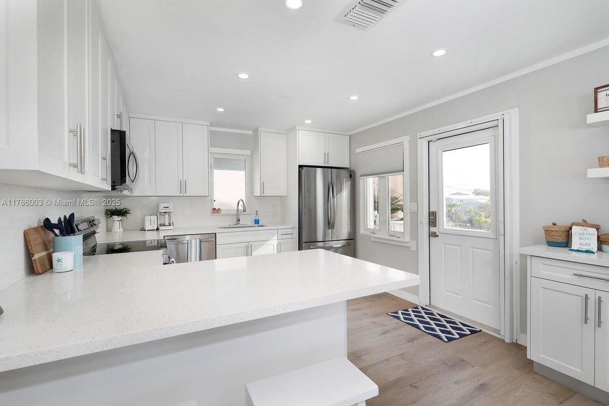 Interior, Kitchen, Recessed Lighting, Stainless Steel Appliances, Wood Texture Flooring