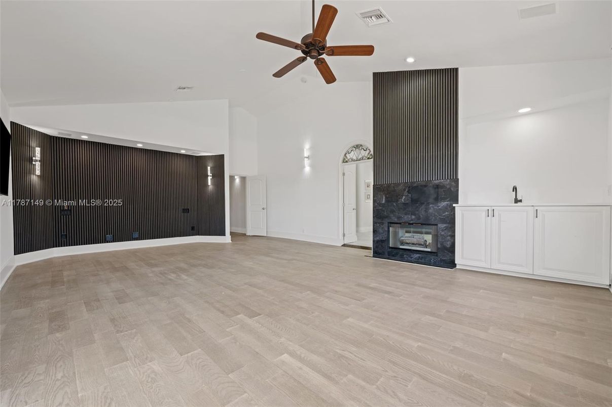 Empty room, Fireplace, Interior, Recessed Lighting, Wood Texture Flooring