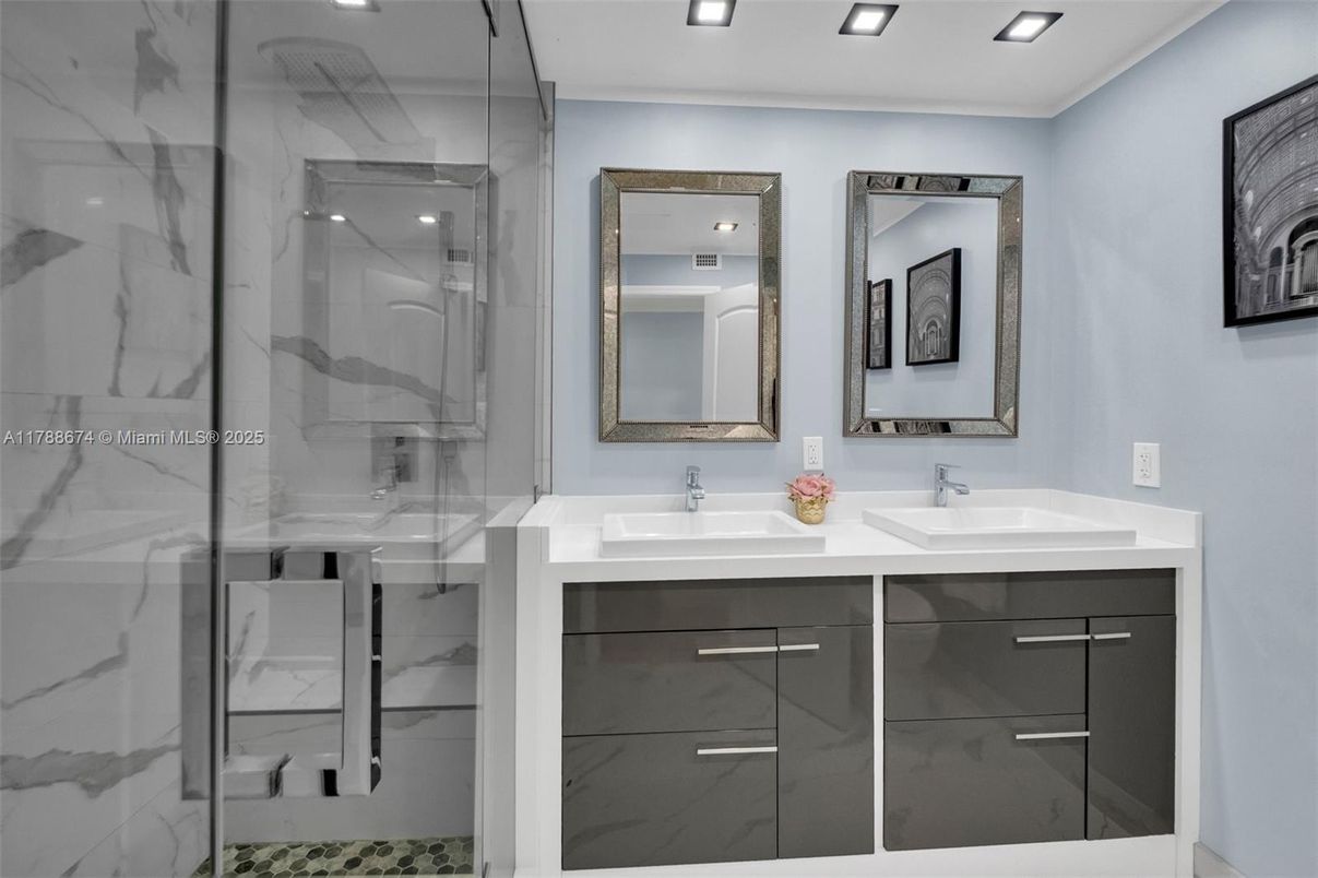 Bathroom, Dual Sink Vanities, Glass Shower, Interior, Marble Walls, Recessed Lighting