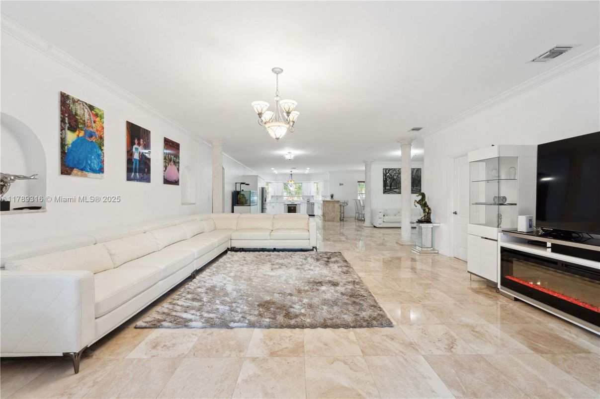 Chandelier, Fireplace, Interior, Living room