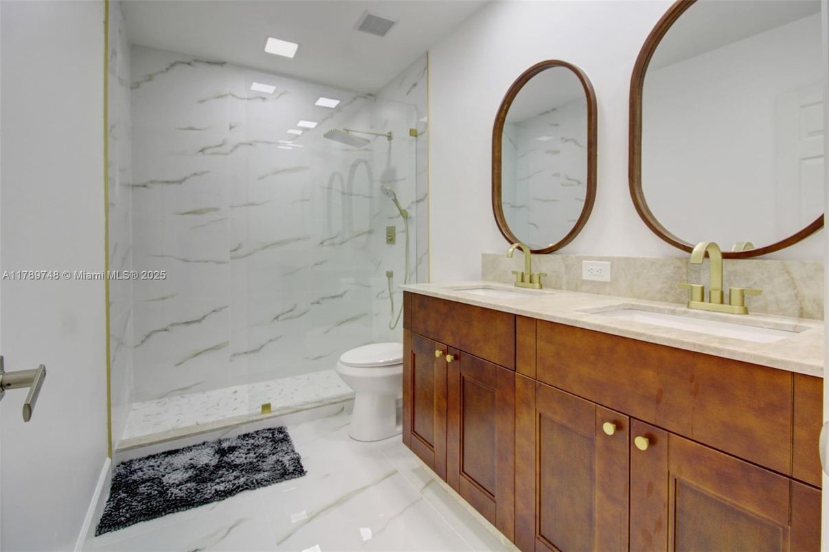 Bathroom, Dual Sink Vanities, Glass Shower, Interior, Marble, Marble Walls