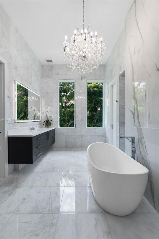 Bathroom, Chandelier, Dual Sink Vanities, Free Standing Baths, Interior, Marble, Marble Walls