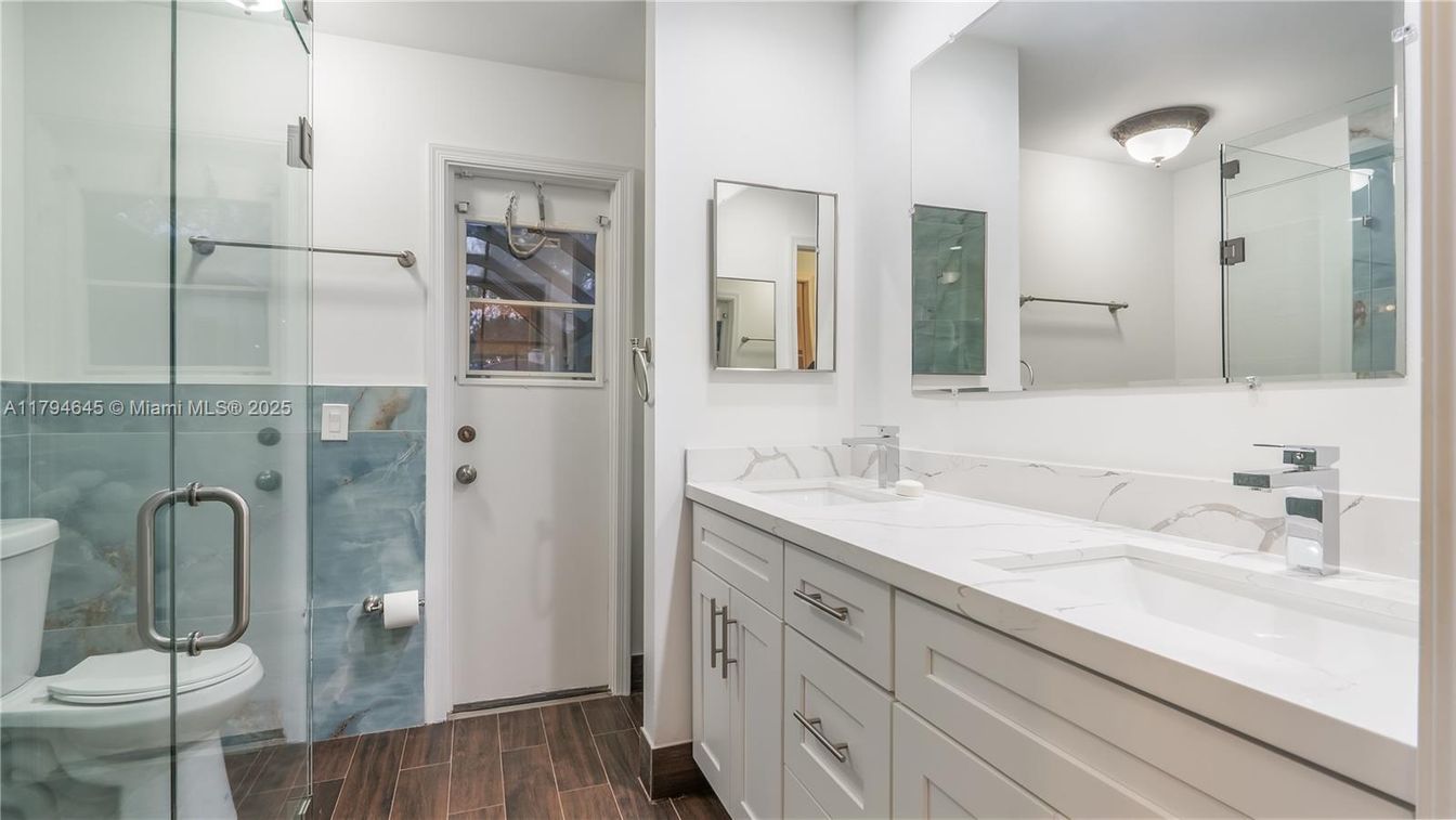 Bathroom, Dual Sink Vanities, Glass Shower, Interior, Wood Texture Flooring
