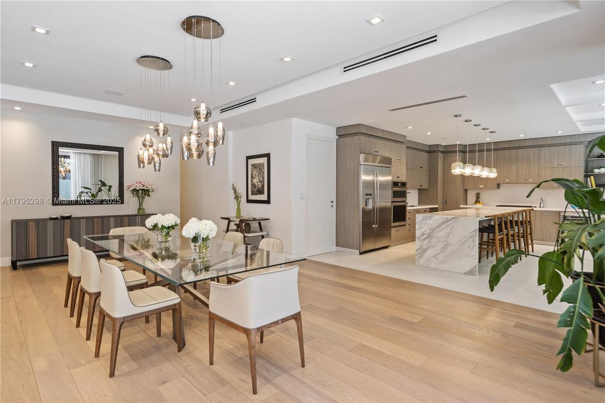 Dining room, Interior, Kitchen, Pendant Lights, Recessed Lighting, Stainless Steel Appliances, Wood Texture Flooring