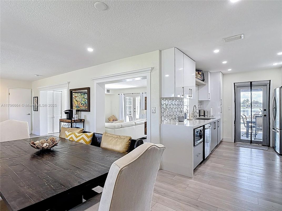 Dining room, Interior, Kitchen, Living room, Recessed Lighting, Wood Texture Flooring