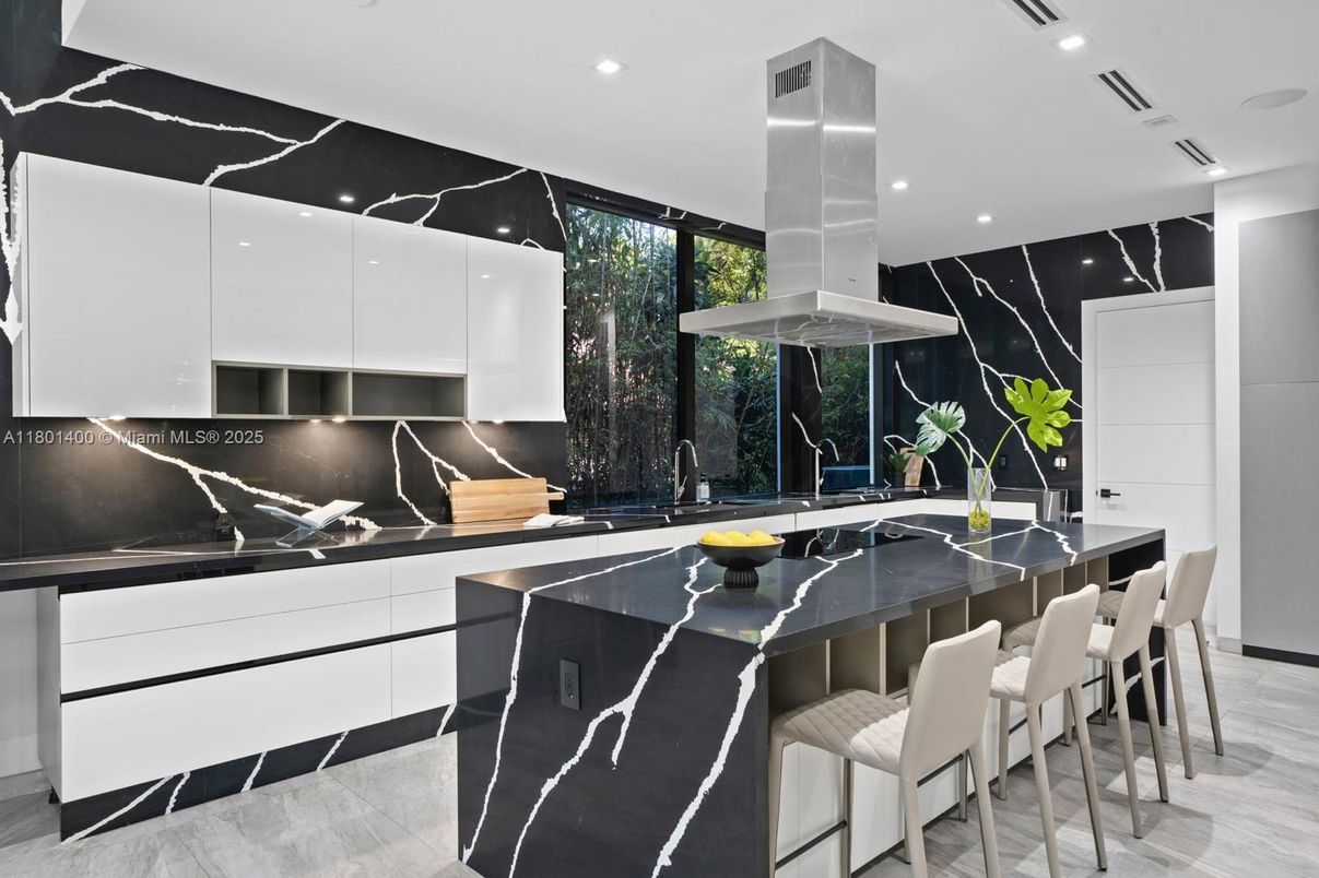 Interior, Kitchen, Marble Walls, Recessed Lighting, Stainless Steel Appliances