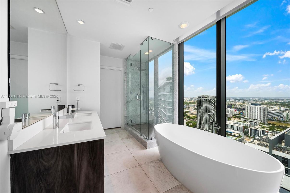 Bathroom, Dual Sink Vanities, Free Standing Baths, Glass Shower, Interior, Marble, Marble Walls, Recessed Lighting