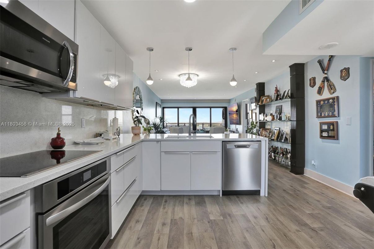 Interior, Kitchen, Pendant Lights, Recessed Lighting, Stainless Steel Appliances, Wood Texture Flooring