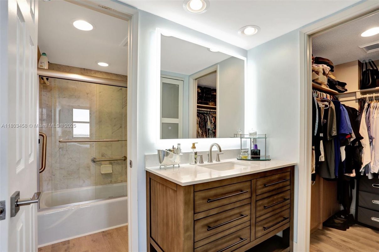 Bathroom, Glass Shower, Interior, Recessed Lighting, Walk-in Closets, Wood Texture Flooring