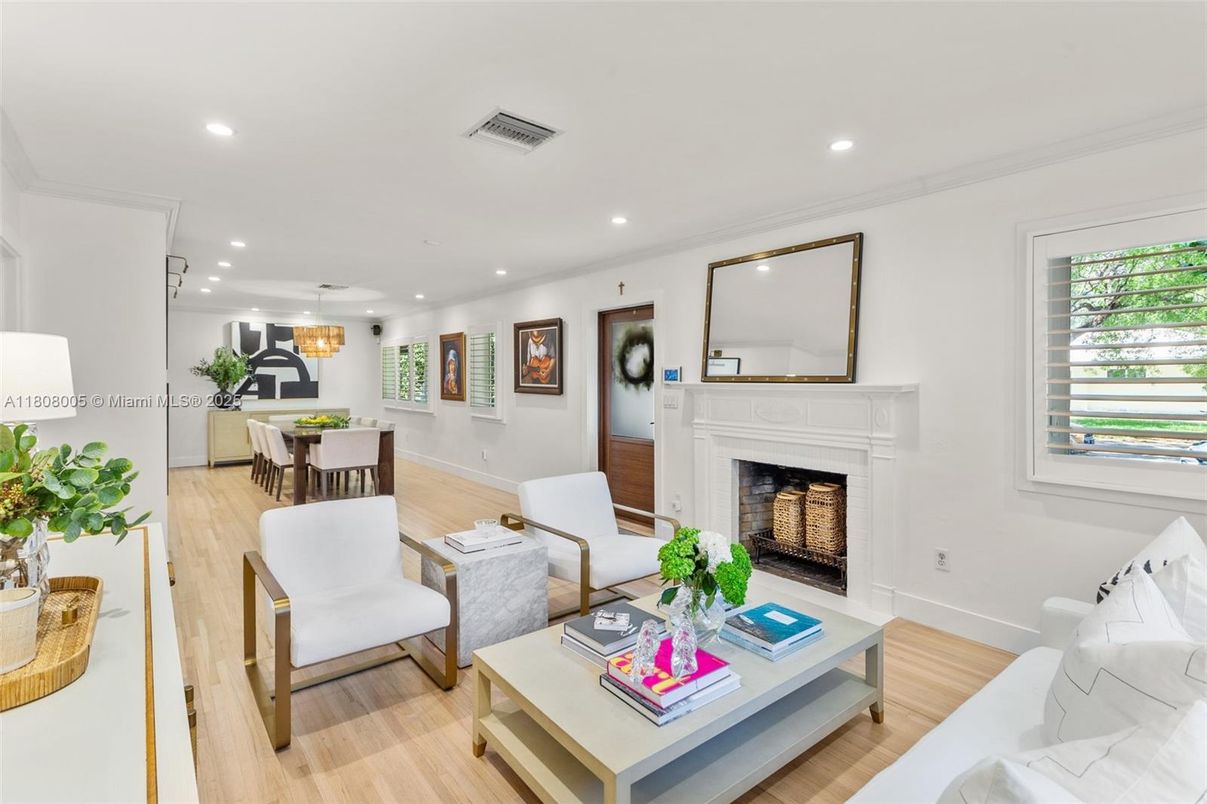 Chandelier, Dining room, Fireplace, Interior, Living room, Pendant Lights, Recessed Lighting, Wood Texture Flooring