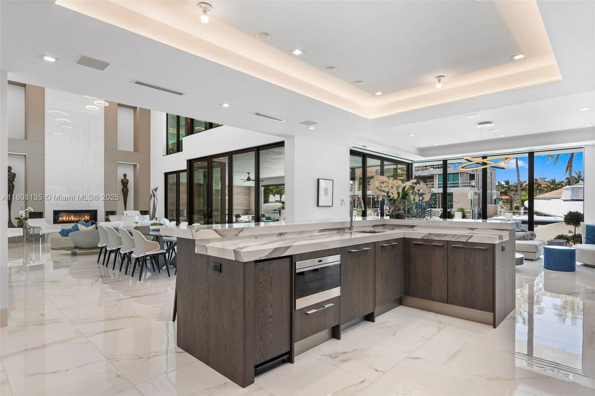 Dining room, Fireplace, Interior, Kitchen, Marble, Pendant Lights, Recessed Lighting, Stainless Steel Appliances