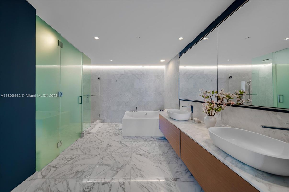Bathroom, Dual Sink Vanities, Glass Shower, Interior, Marble, Marble Walls, Recessed Lighting