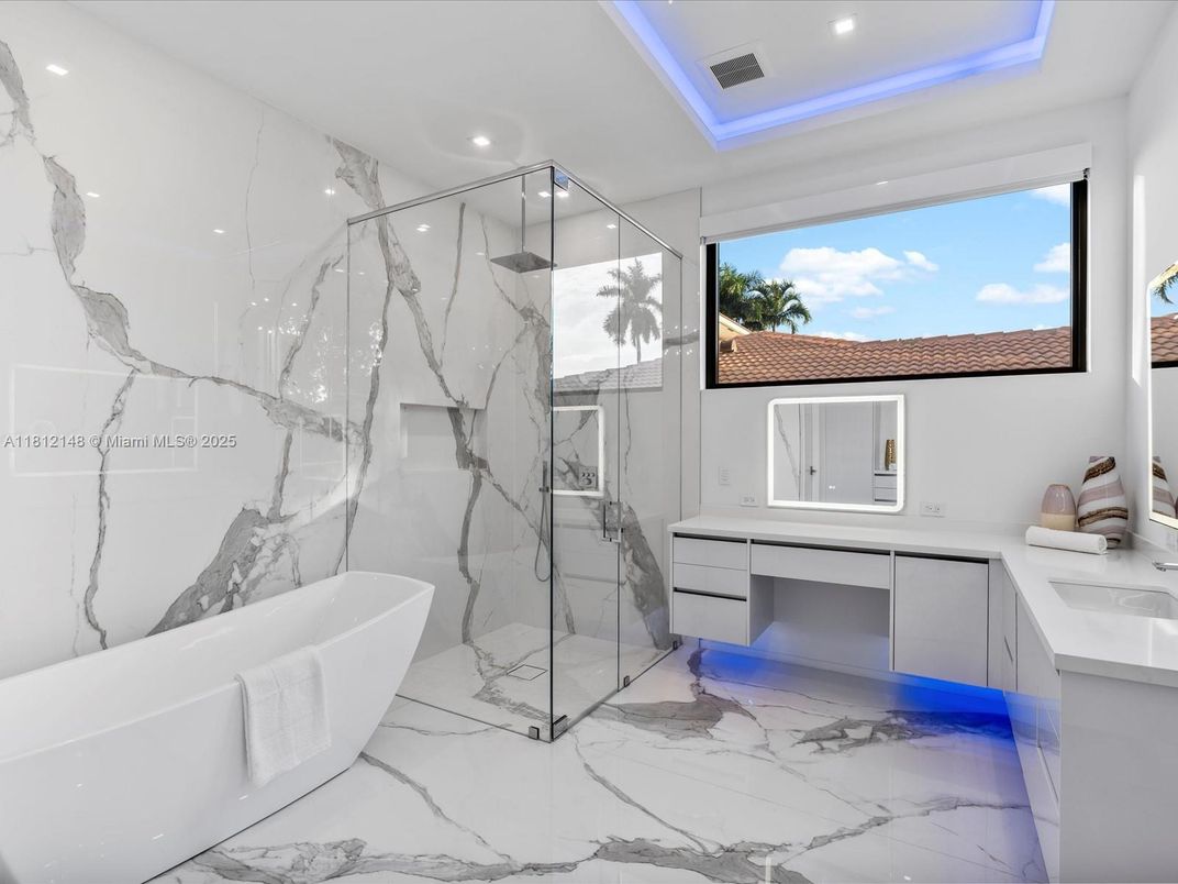 Bathroom, Free Standing Baths, Glass Shower, Interior, Marble, Marble Walls, Recessed Lighting
