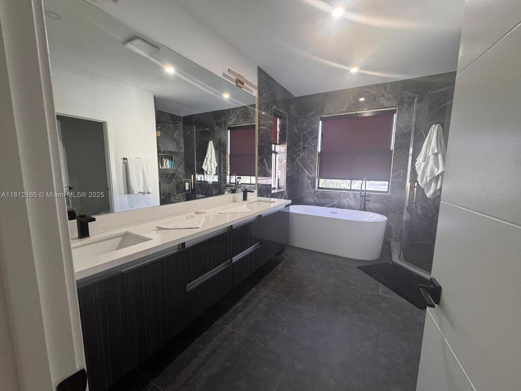 Bathroom, Dual Sink Vanities, Free Standing Baths, Interior, Marble Walls, Recessed Lighting