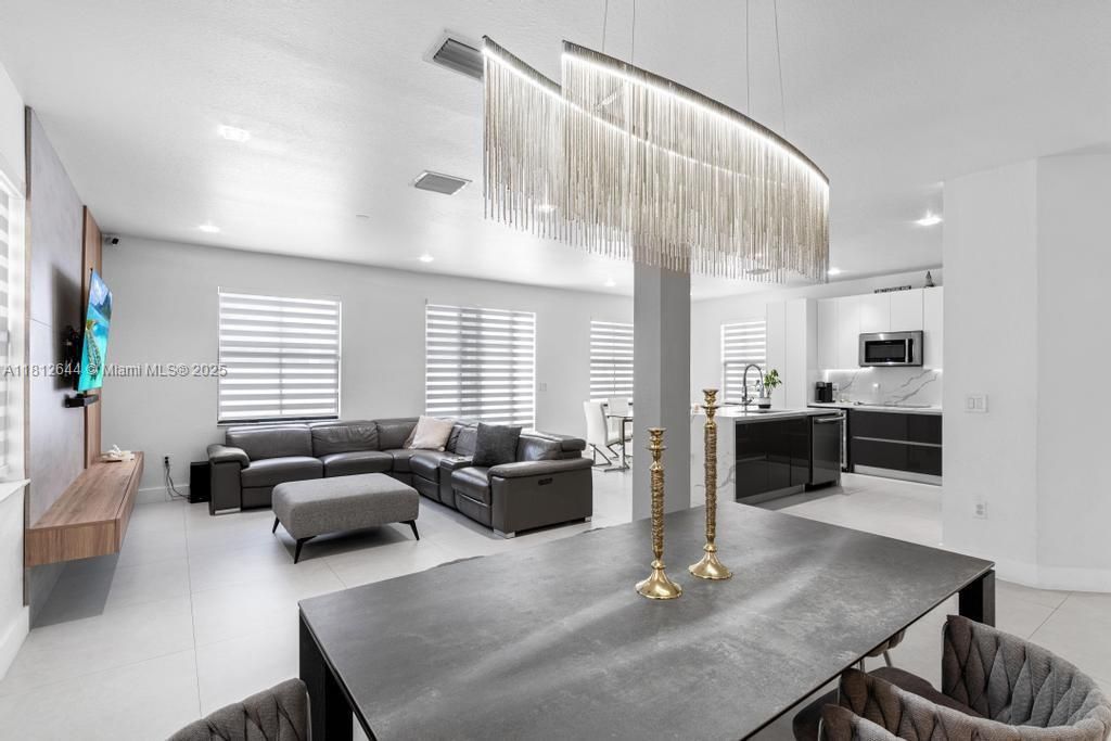 Chandelier, Dining room, Interior, Kitchen, Living room, Pendant Lights, Recessed Lighting, Stainless Steel Appliances