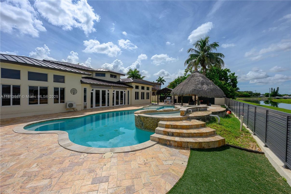 Exterior, Pool, Solar Panels