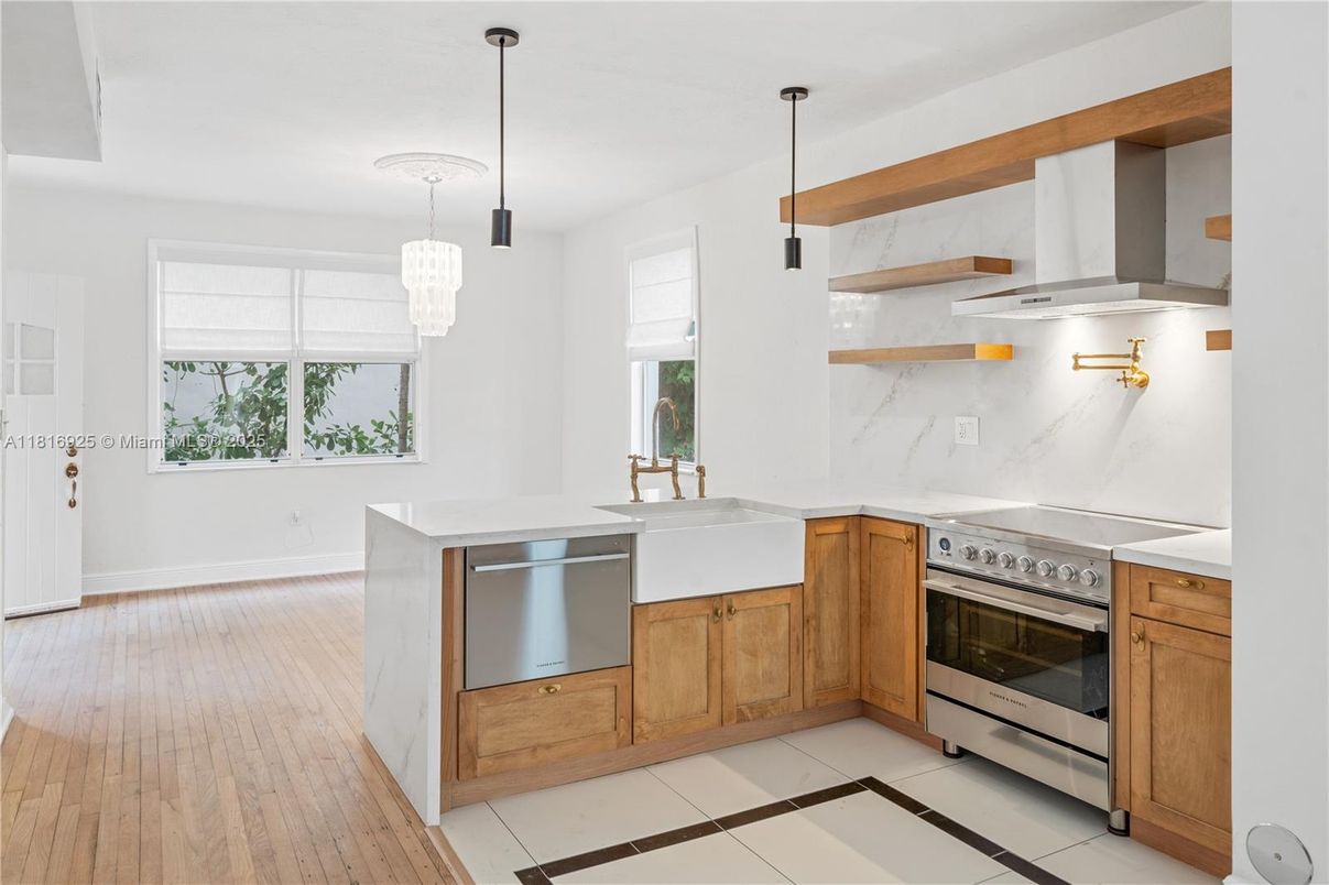 Interior, Kitchen, Marble Walls, Pendant Lights, Stainless Steel Appliances, Wood Texture Flooring