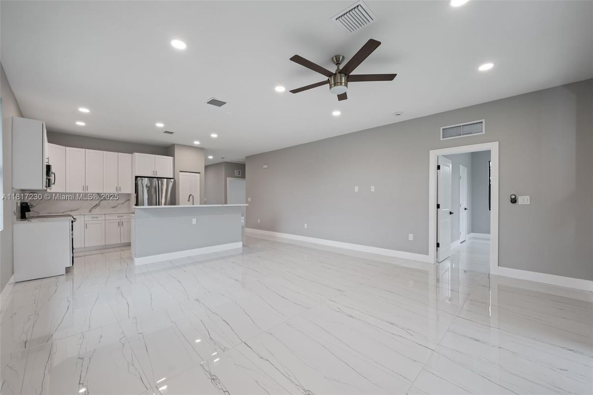 Empty room, Interior, Kitchen, Marble, Recessed Lighting, Stainless Steel Appliances