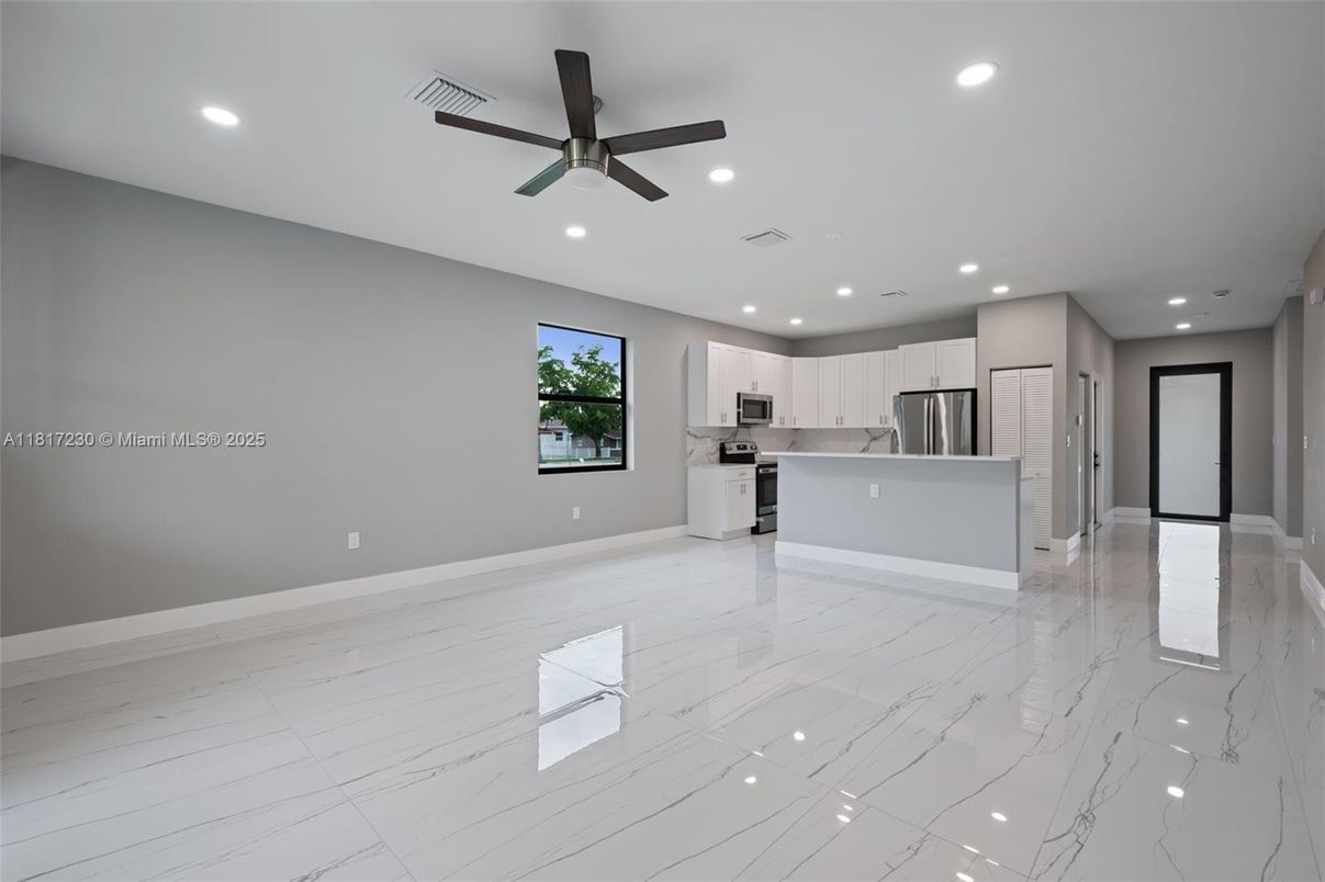 Empty room, Interior, Kitchen, Marble, Recessed Lighting, Stainless Steel Appliances