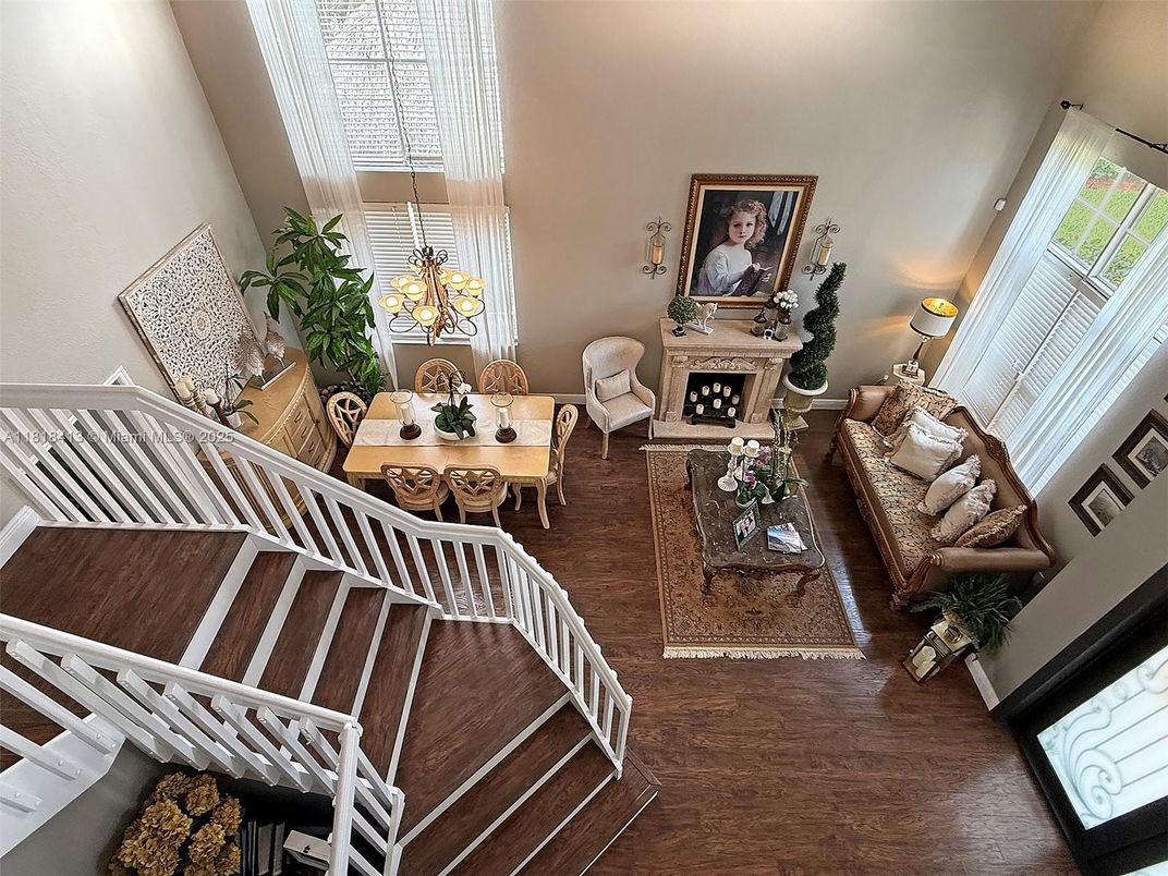 Chandelier, Dining room, Fireplace, Interior, Living room, Pendant Lights, Wood Texture Flooring