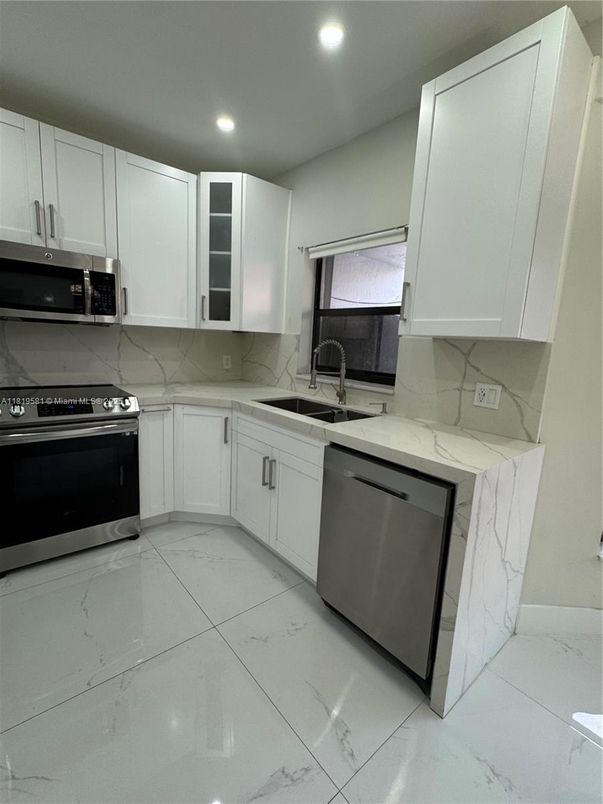 Interior, Kitchen, Marble, Marble Walls, Recessed Lighting, Stainless Steel Appliances