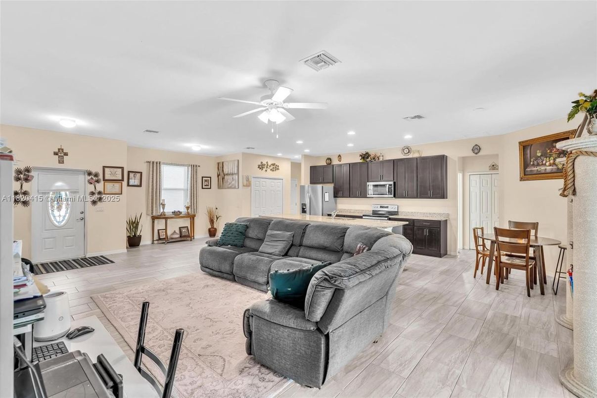 Dining room, Interior, Kitchen, Living room, Recessed Lighting, Stainless Steel Appliances, Wood Texture Flooring