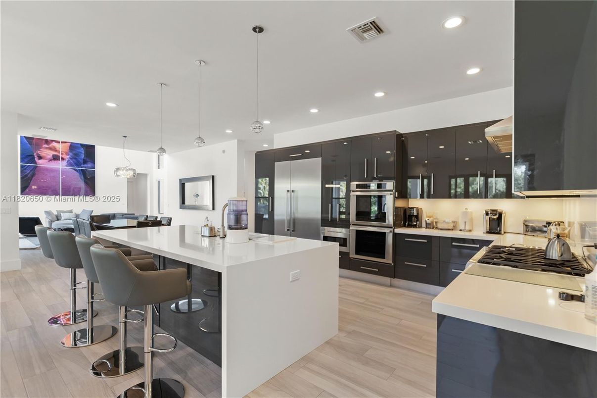 Interior, Kitchen, Pendant Lights, Recessed Lighting, Stainless Steel Appliances, Wood Texture Flooring