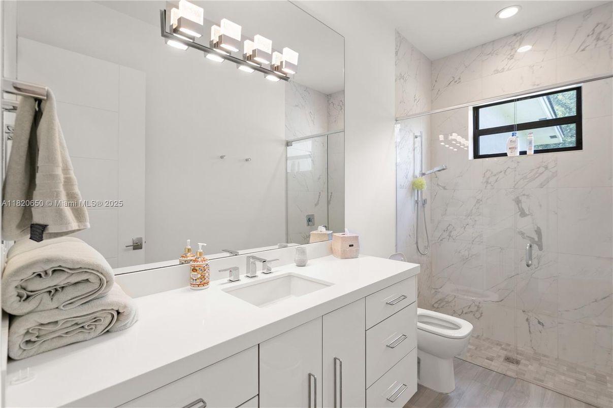Bathroom, Glass Shower, Interior, Marble Walls, Recessed Lighting, Wood Texture Flooring