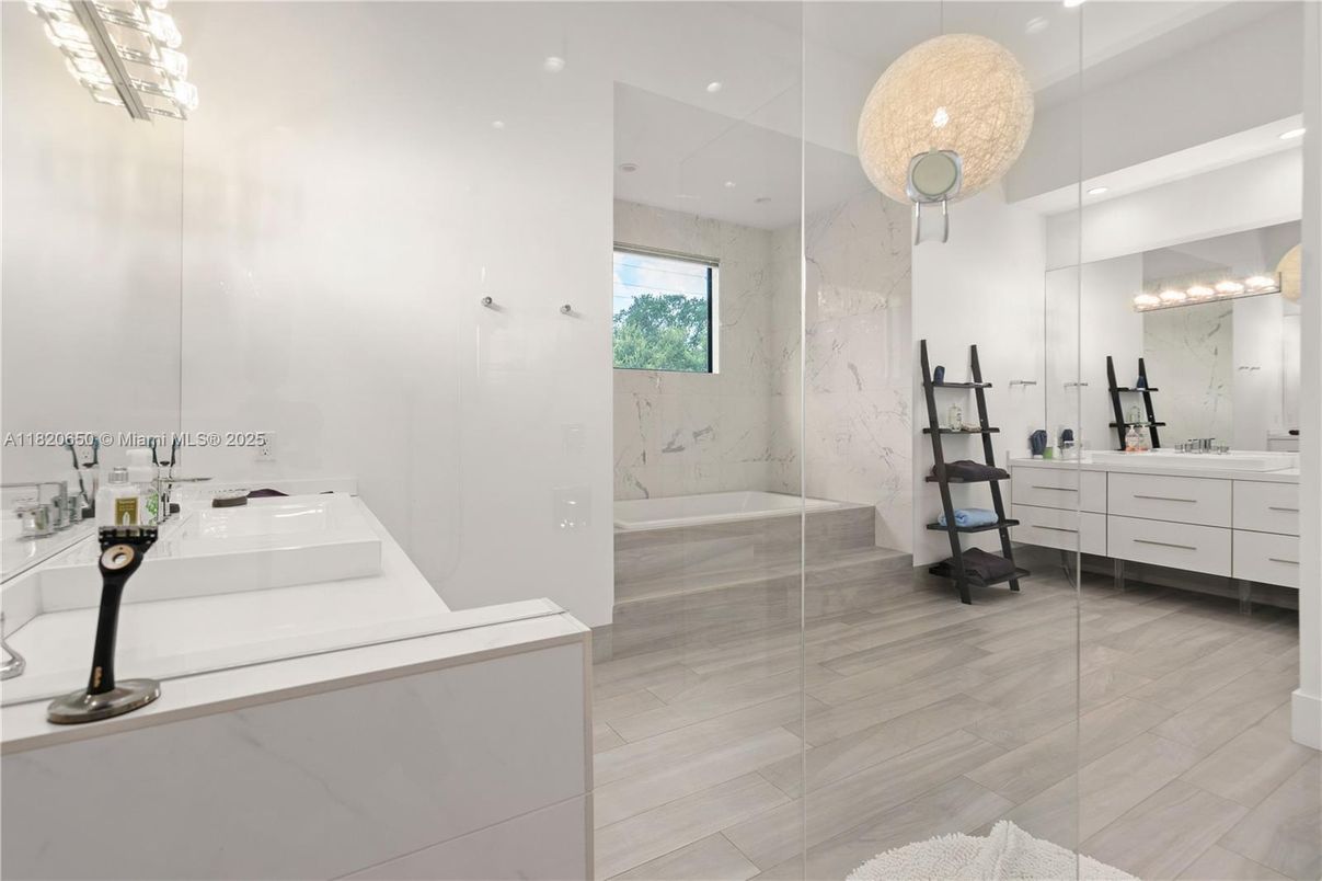 Bathroom, Dual Sink Vanities, Glass Shower, Interior, Marble Walls, Recessed Lighting