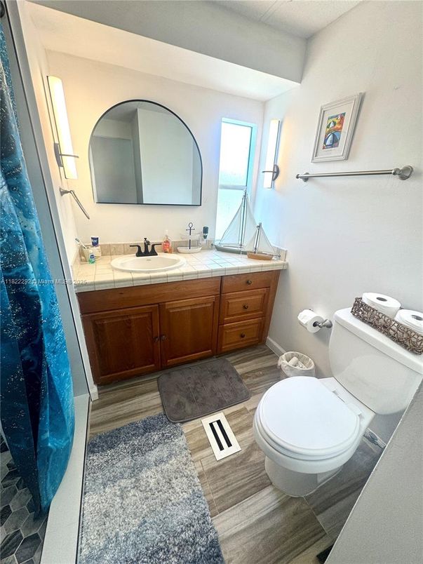 Bathroom, Interior, Tile Countertops, Wood Texture Flooring