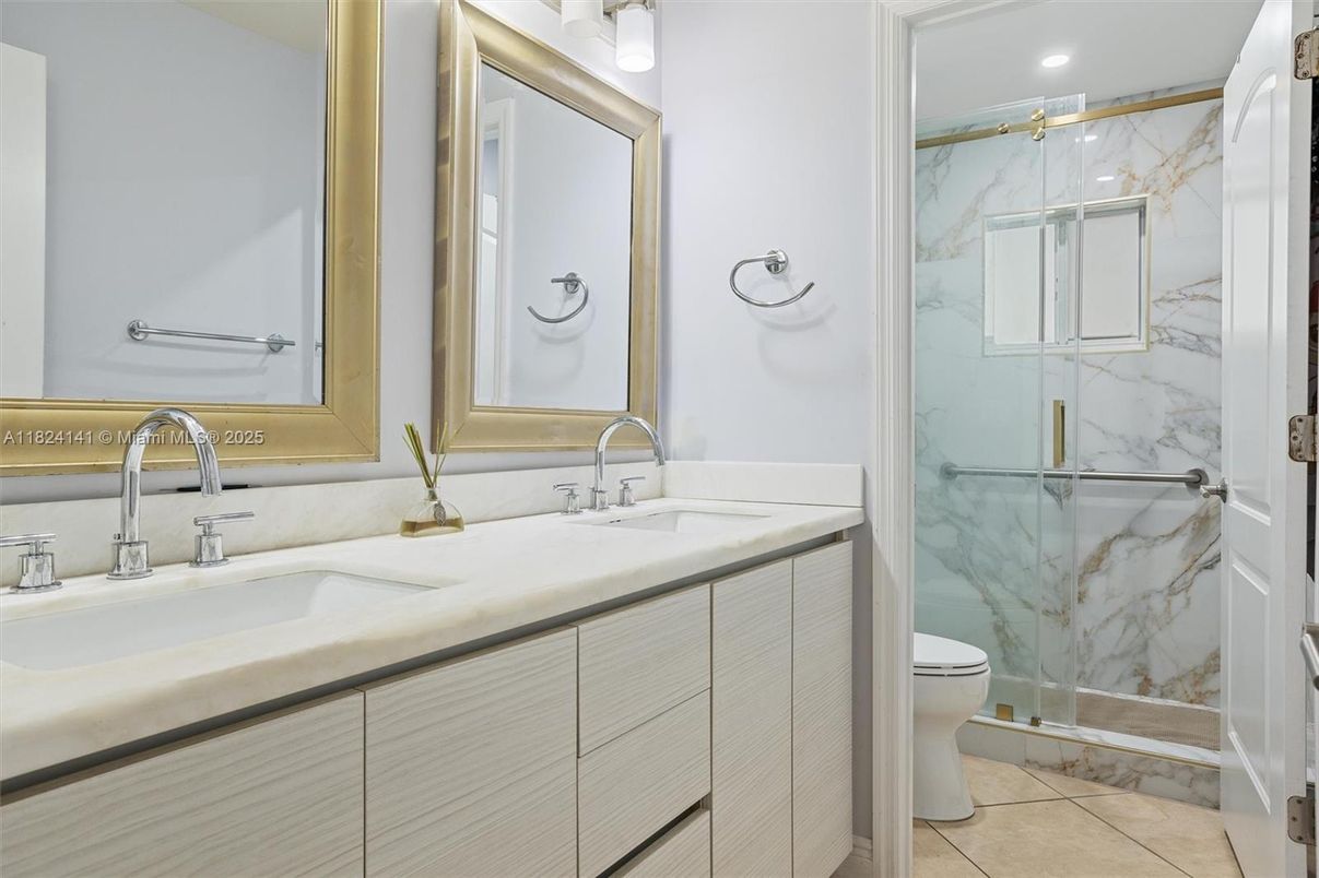 Bathroom, Dual Sink Vanities, Glass Shower, Interior, Marble Walls, Recessed Lighting
