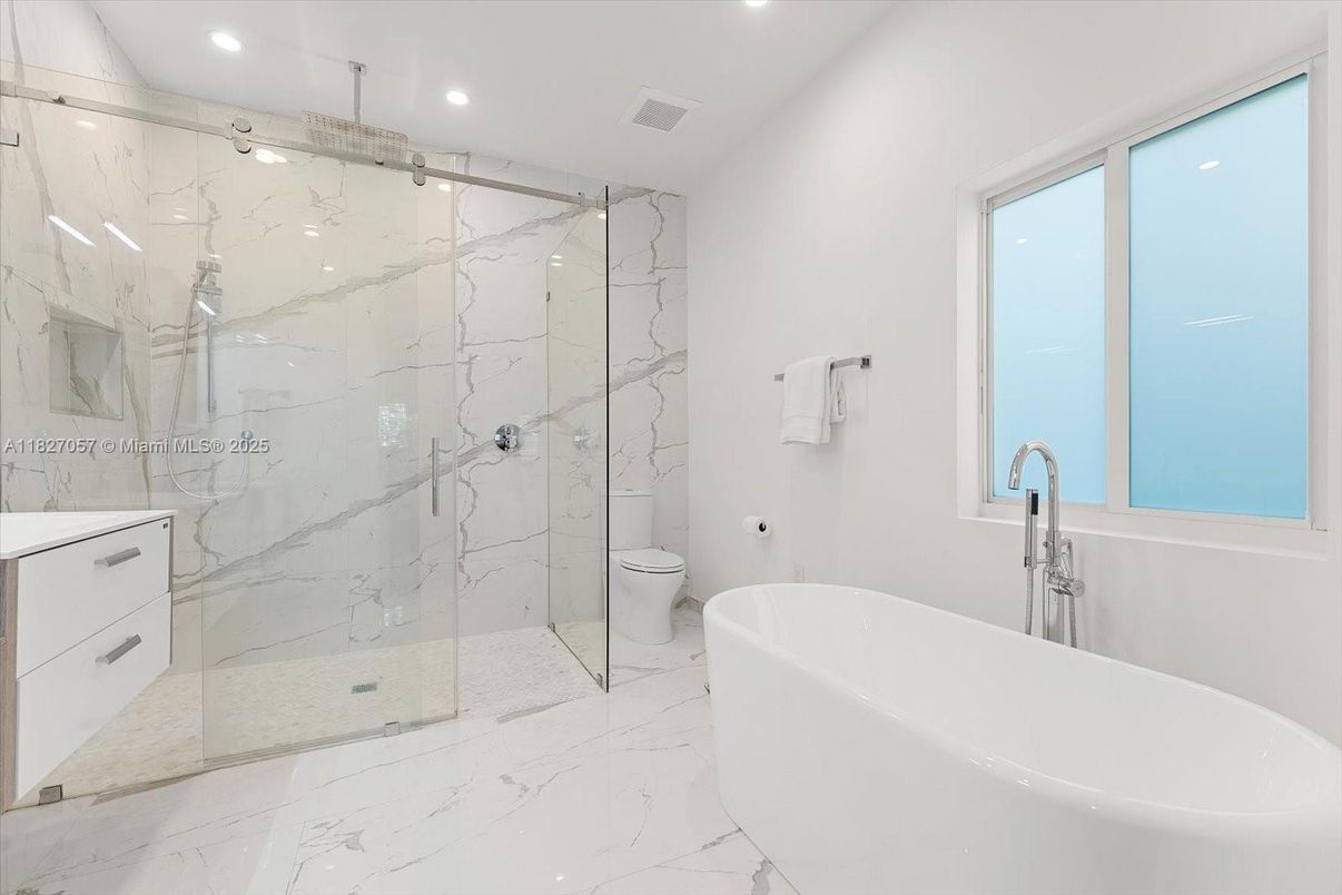 Bathroom, Free Standing Baths, Glass Shower, Interior, Marble, Marble Walls, Recessed Lighting