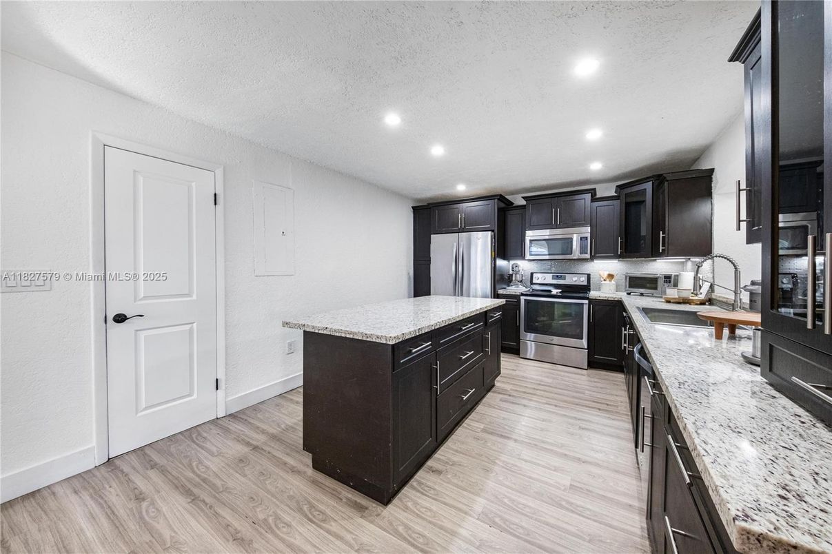 Interior, Kitchen, Recessed Lighting, Stainless Steel Appliances, Wood Texture Flooring