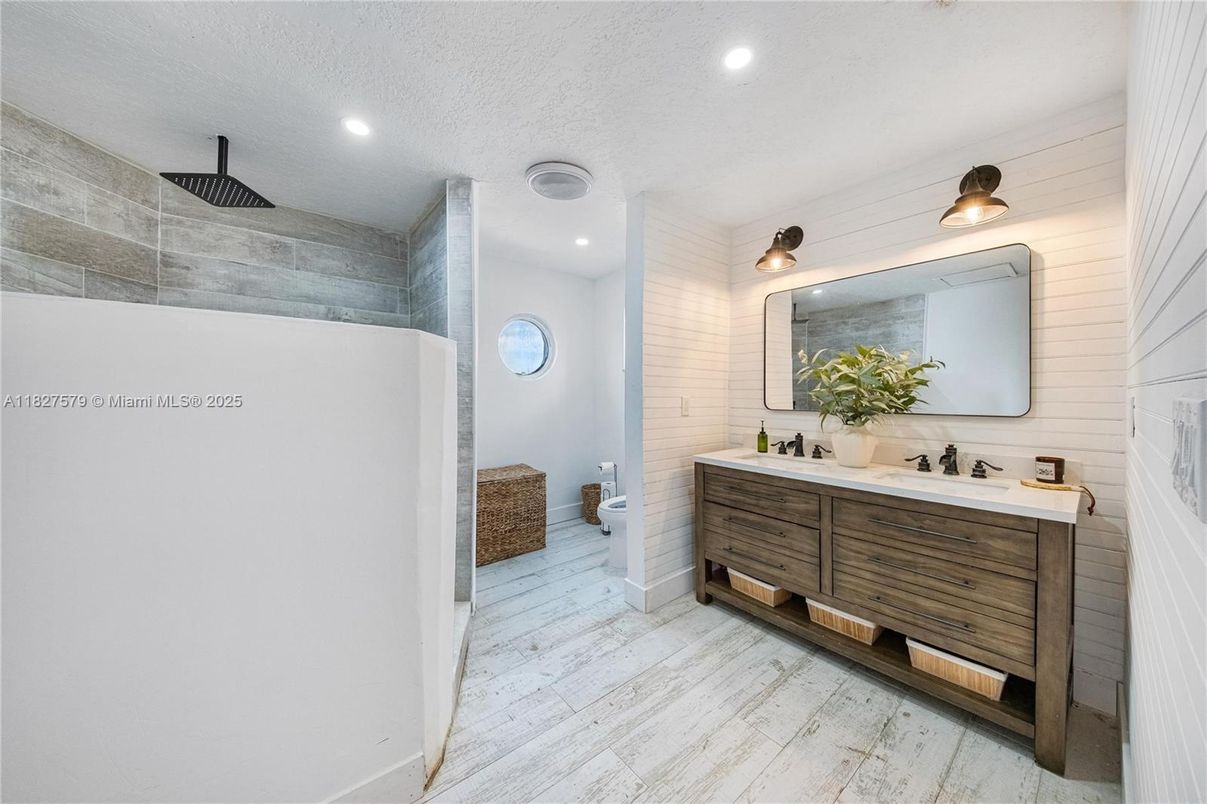 Bathroom, Dual Sink Vanities, Interior, Recessed Lighting, Wood Texture Flooring