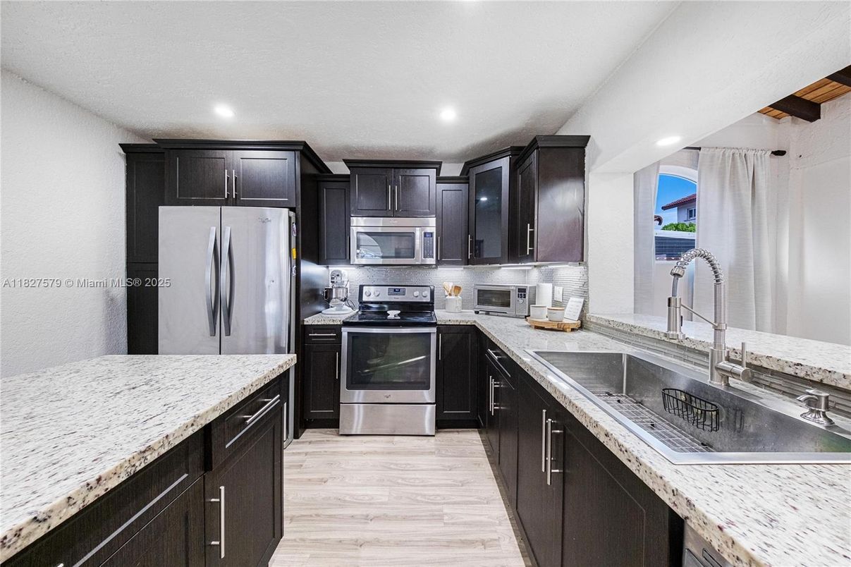 Interior, Kitchen, Recessed Lighting, Stainless Steel Appliances, Wood Texture Flooring