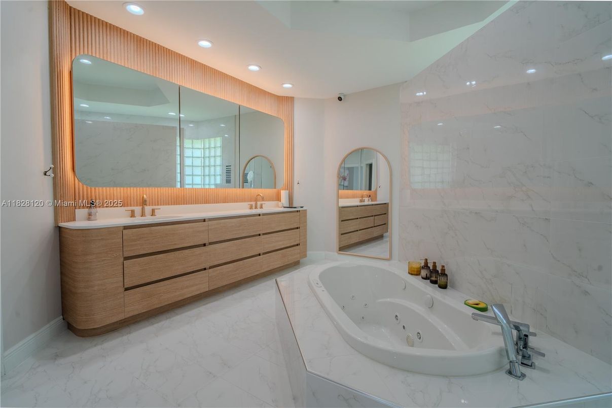Bathroom, Dual Sink Vanities, Glass Shower, Interior, Marble, Marble Walls, Recessed Lighting