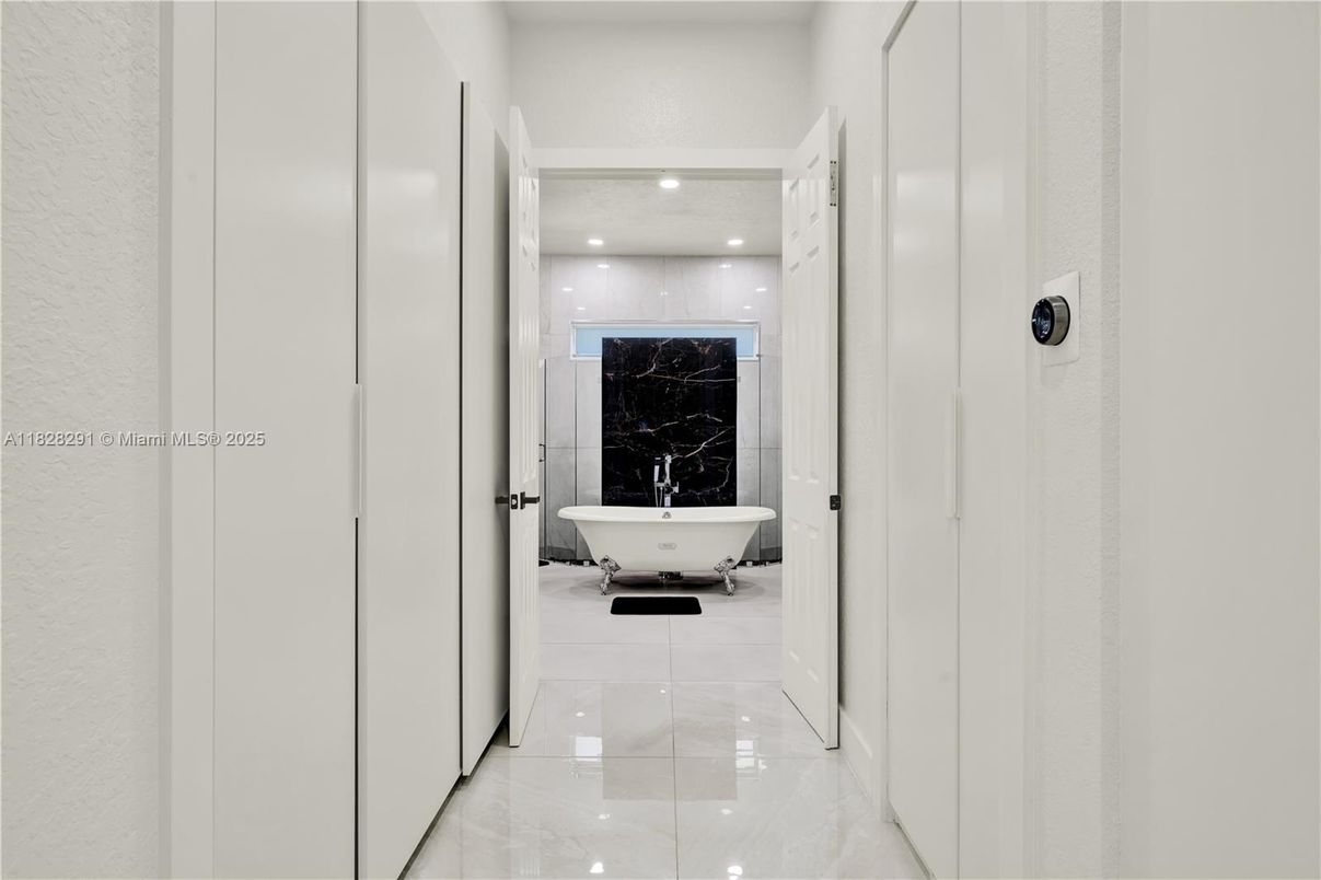 Bathroom, Free Standing Baths, Interior, Marble, Marble Walls, Recessed Lighting