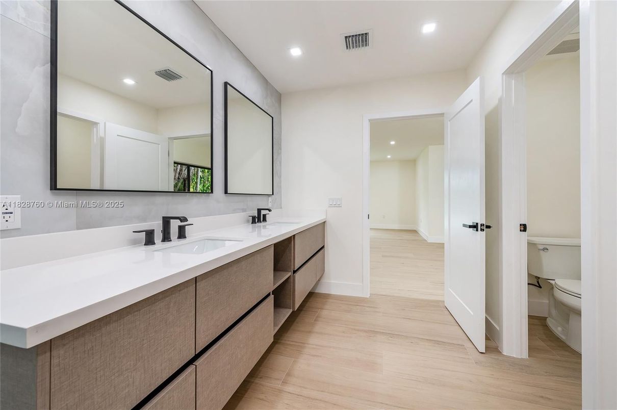 Bathroom, Dual Sink Vanities, Interior, Recessed Lighting, Wood Texture Flooring