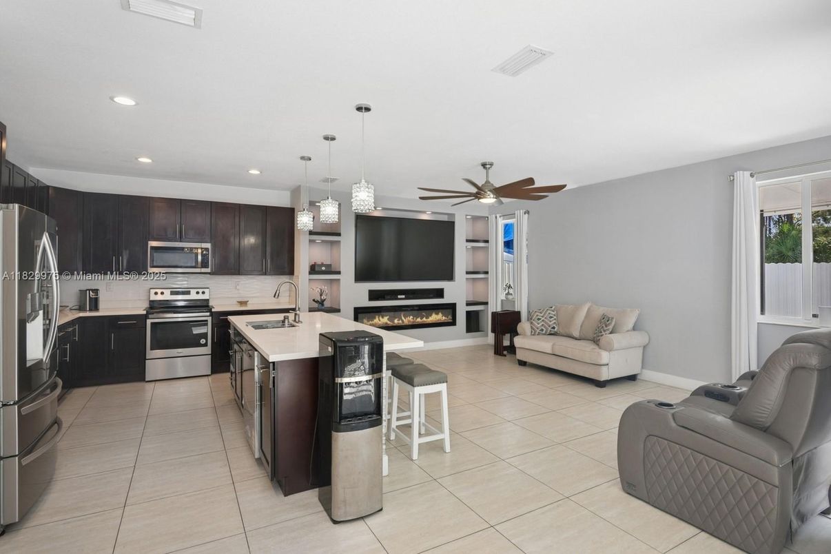 Fireplace, Interior, Kitchen, Living room, Pendant Lights, Recessed Lighting, Stainless Steel Appliances