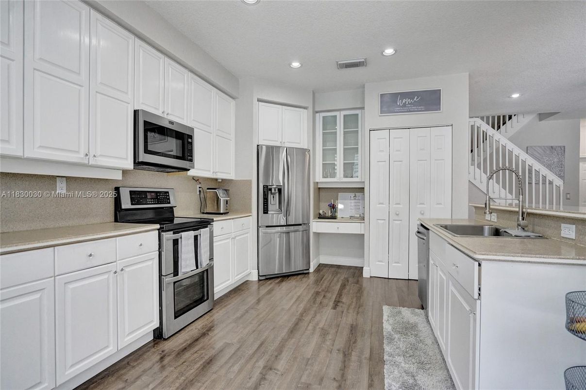 Interior, Kitchen, Recessed Lighting, Stainless Steel Appliances, Wood Texture Flooring