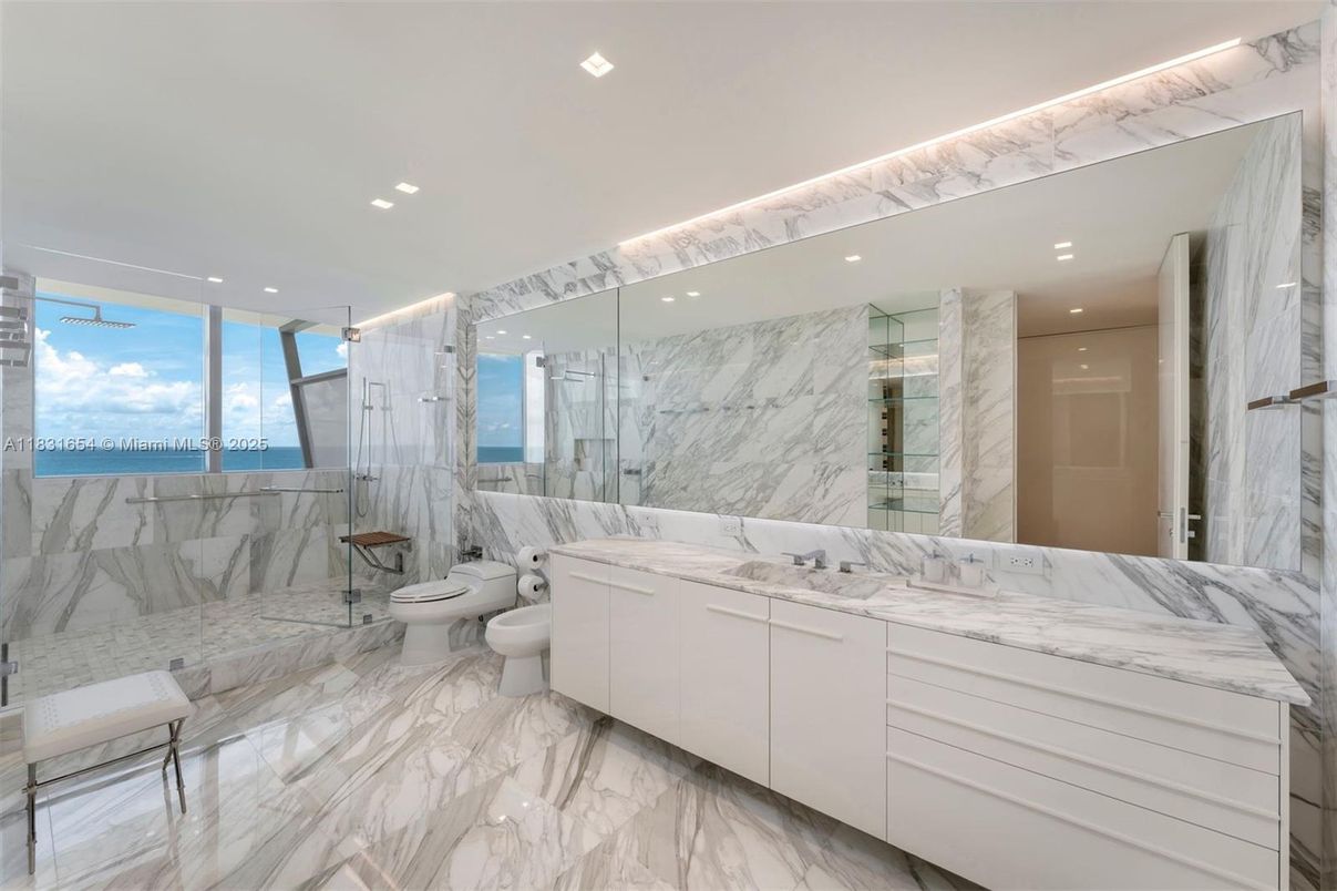 Bathroom, Dual Sink Vanities, Glass Shower, Interior, Marble, Marble Walls, Recessed Lighting, Water