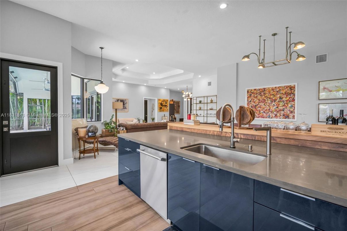 Dining room, Interior, Kitchen, Pendant Lights, Recessed Lighting, Stainless Steel Appliances, Wood Texture Flooring