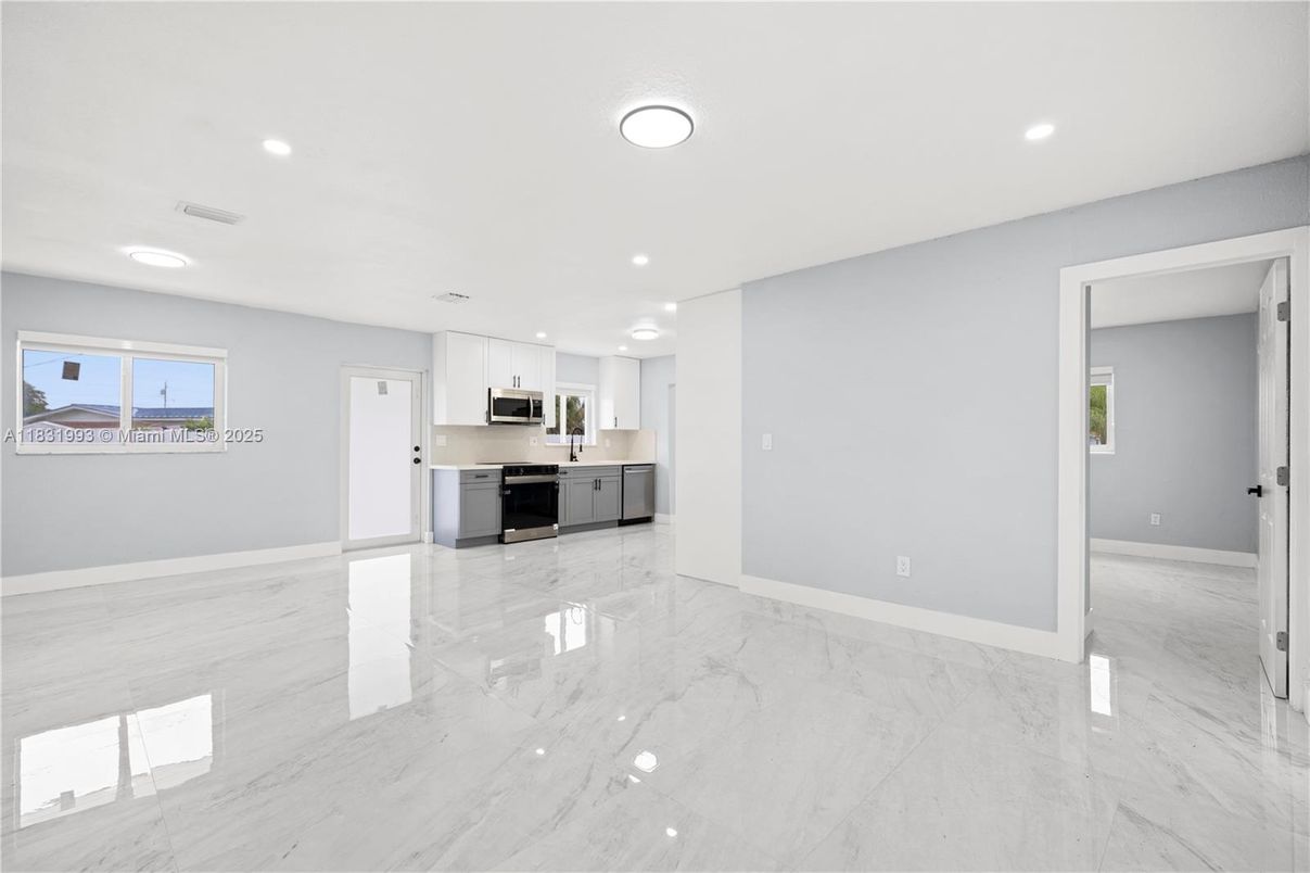 Empty room, Interior, Kitchen, Marble, Recessed Lighting, Stainless Steel Appliances